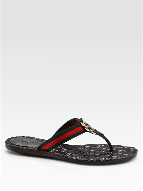 brown gucci flip flops